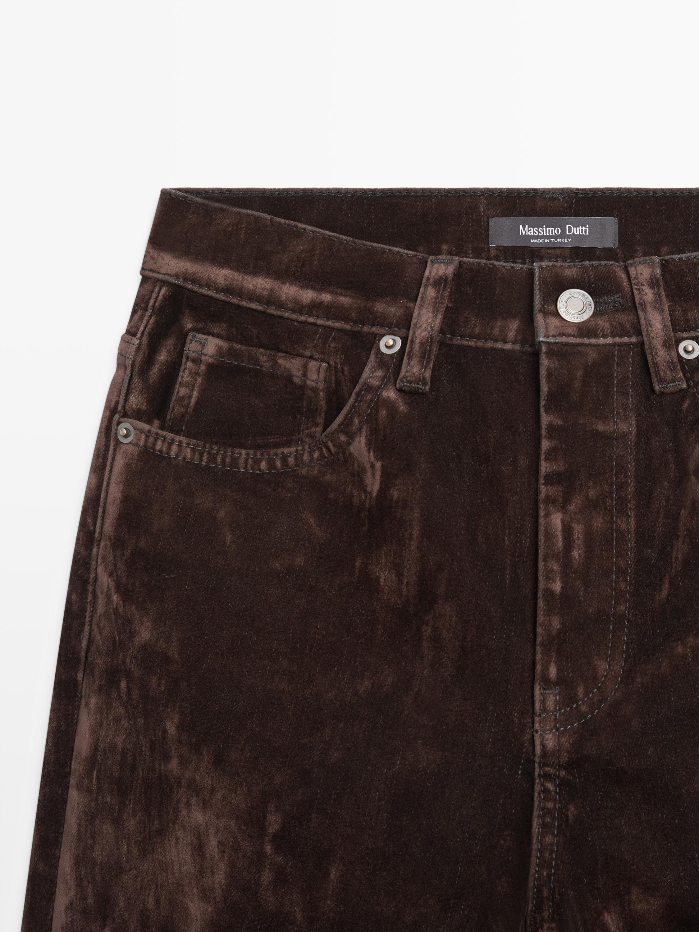 High-waist flocked boot-cut jeans